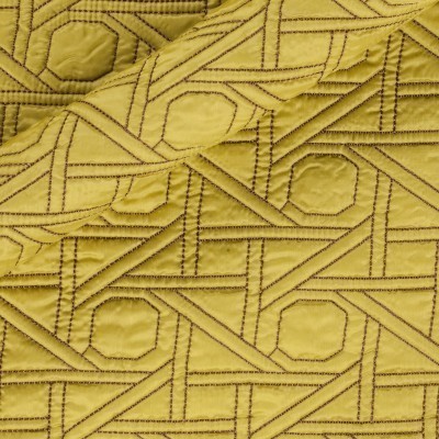 Quilted fabric with embroidery